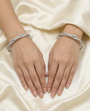Turquoise-Accented Silver Bangles Gallery View