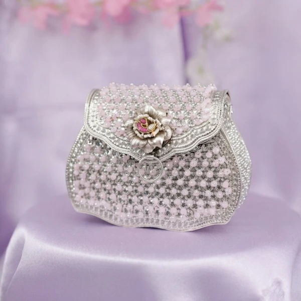 Luxury Silver Beaded Potli Clutch with Floral Accent